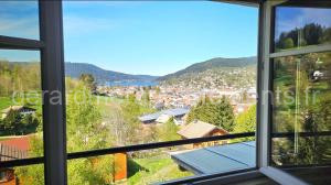 f2 VUE INCROYABLe sur lac avec jardin avec balnéo et 400m centre à Gérardmer